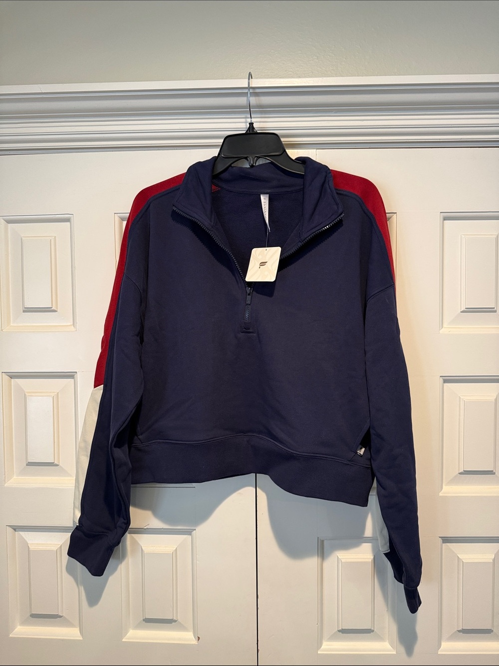 Fabletics Navy Quarter-Zip Sweatshirt with Red Panels